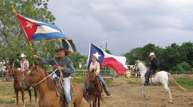 The-Cuban-and-Texas-flags-flying-together-during-a-pleasure-ride-outside-of-Havana.-This-event-minus-the-Texas-flag-made-page-3-of-the-NY-Times-on-November-12-2007.