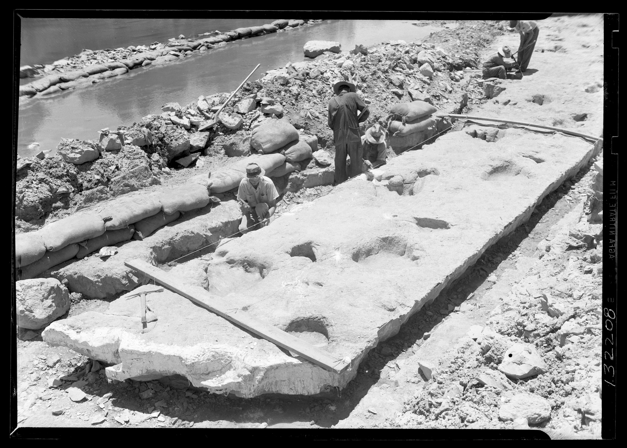 Workers excavate dinosaur trackways in Texas. 