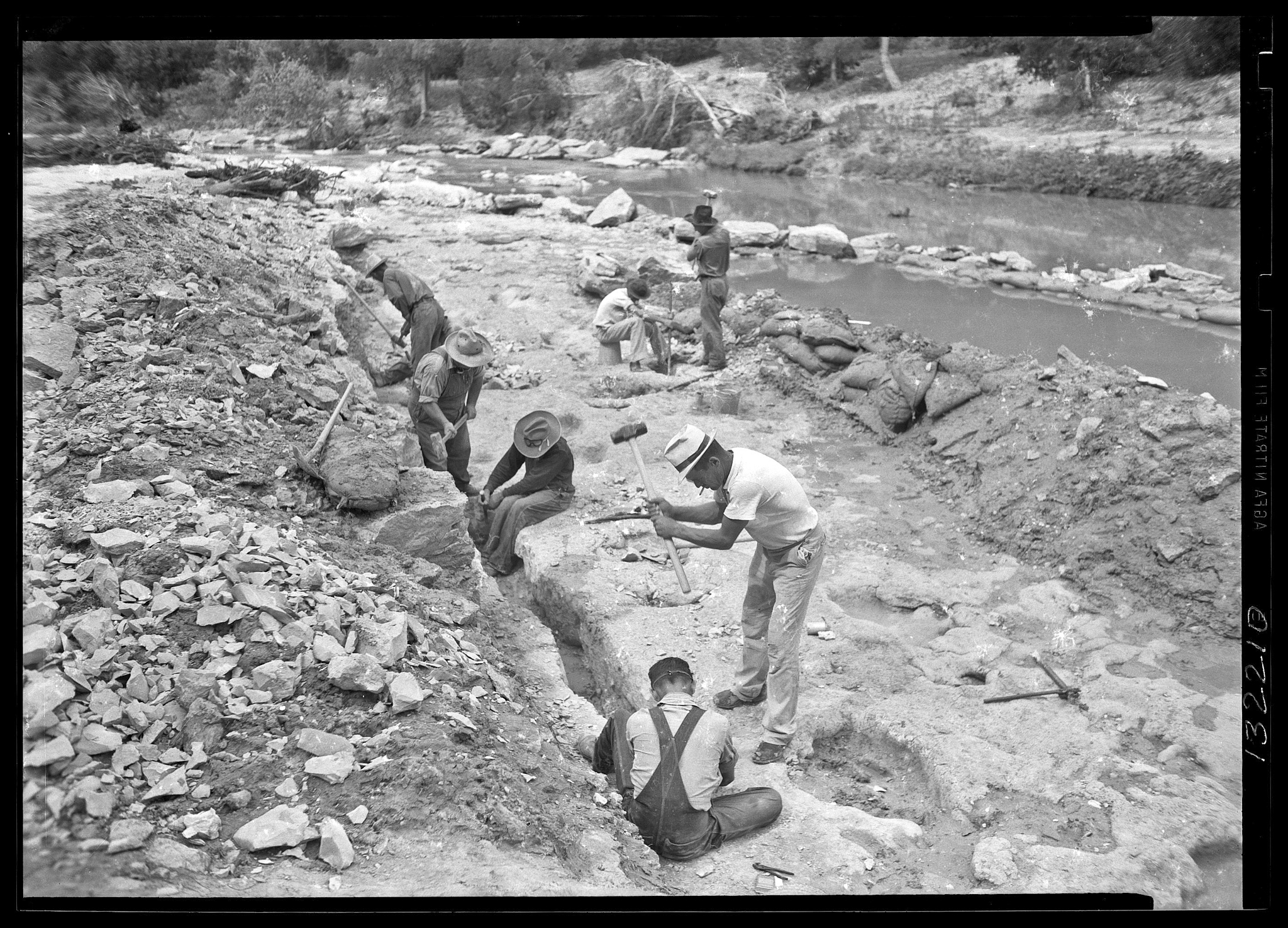 Workers excavate dinosaur trackways in Texas. 