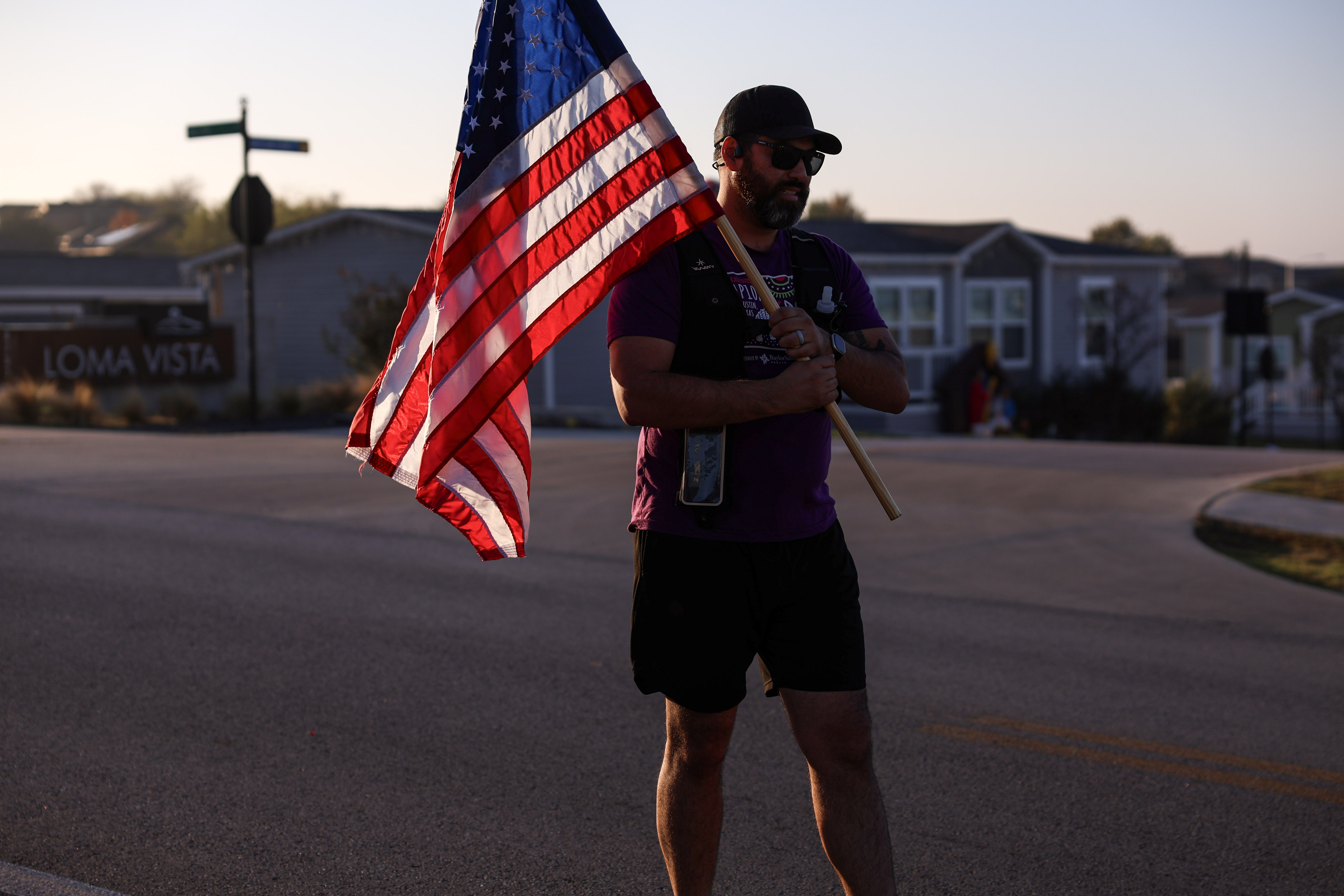 A runner in the Rivalry Relay, supporting Army Aviation Gold Star Families