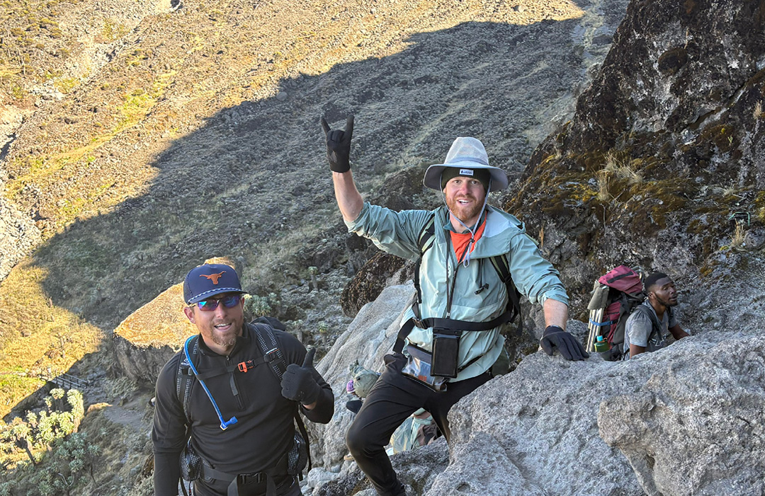 Two climbers on the mountainside of Kilimanjaro