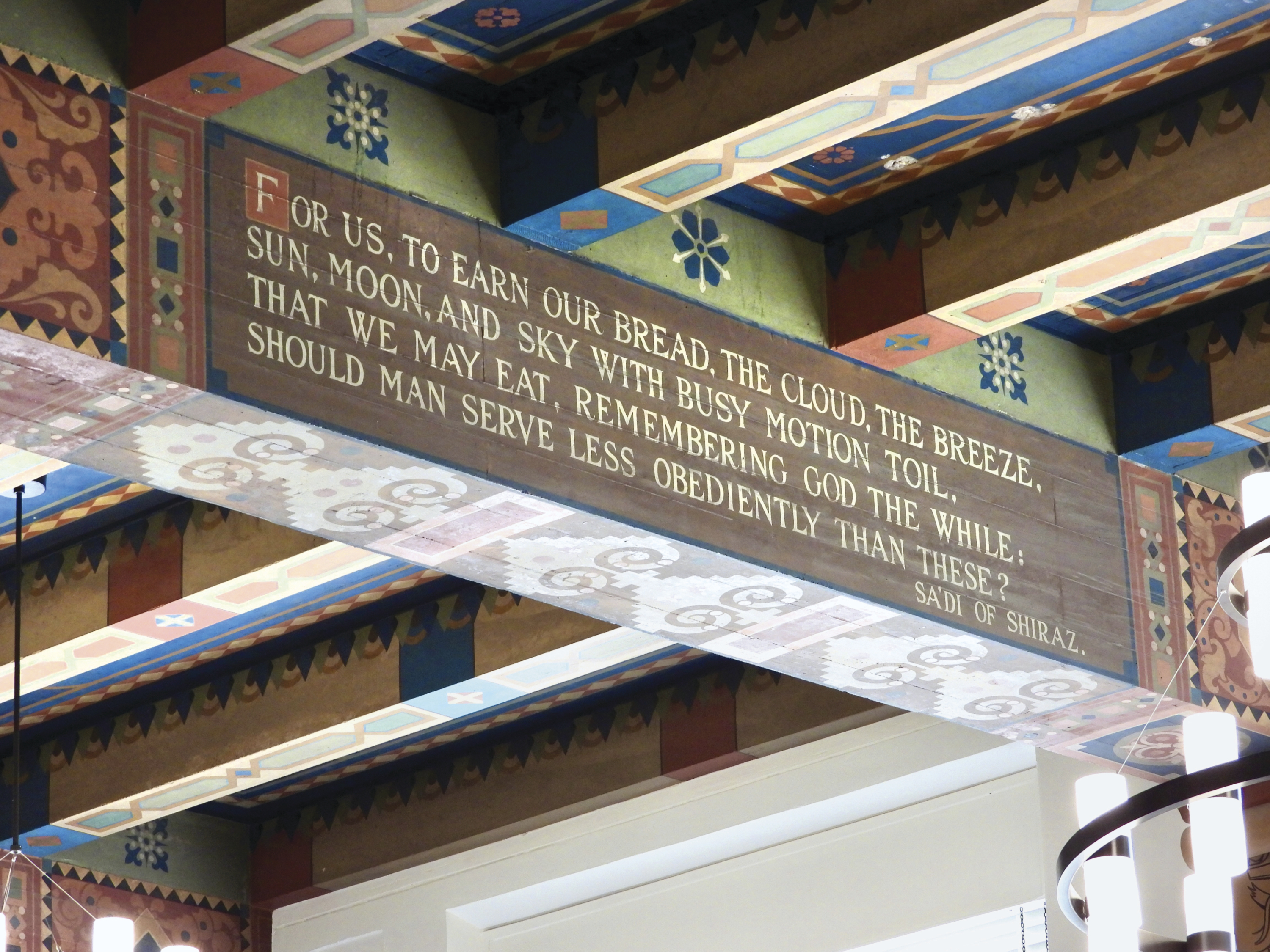 Noble words on the ceiling beams.