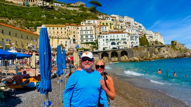 Two folks on the beach at the Amalfi Coast, Italy.