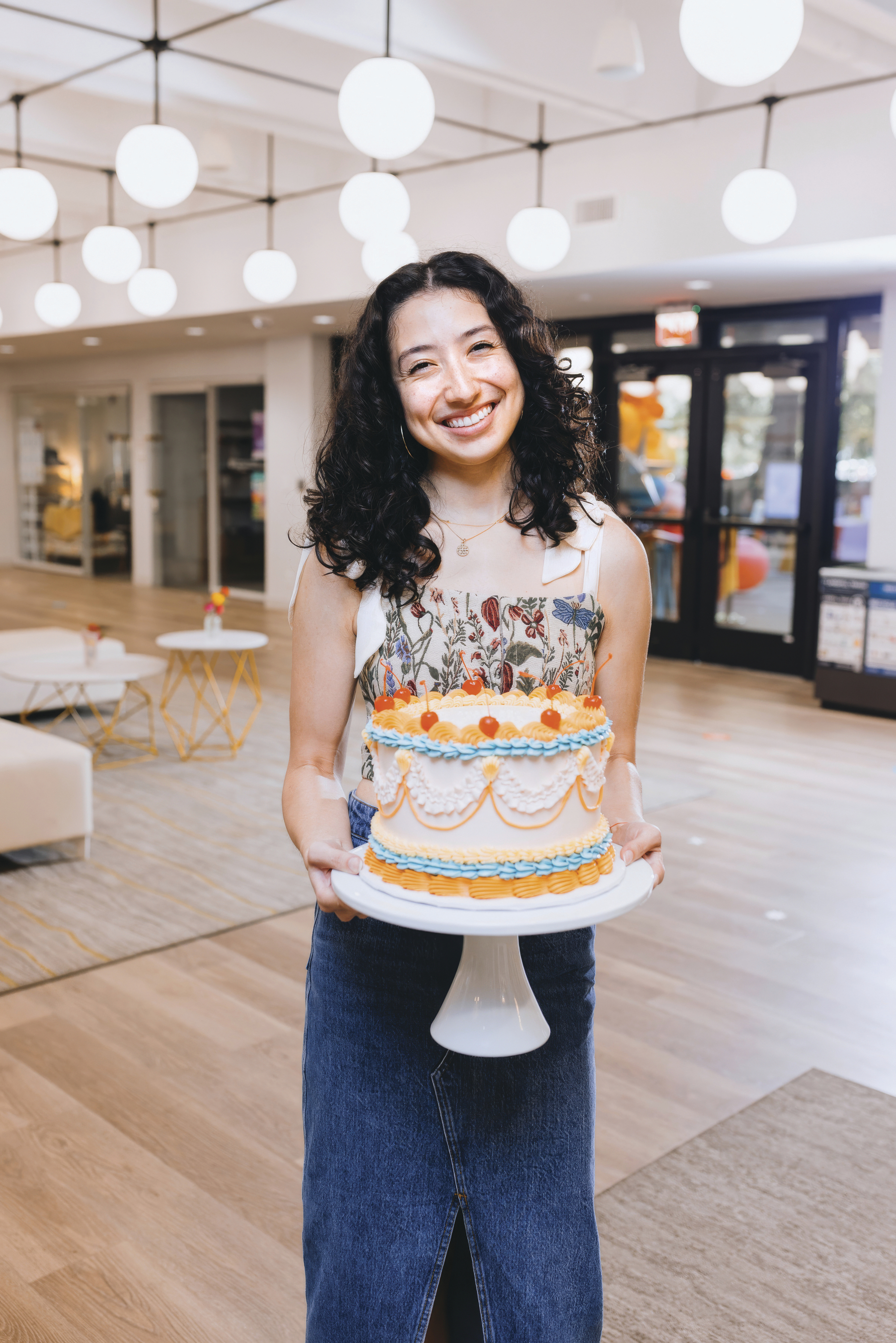 Reese Saliceti with one of her cakes.