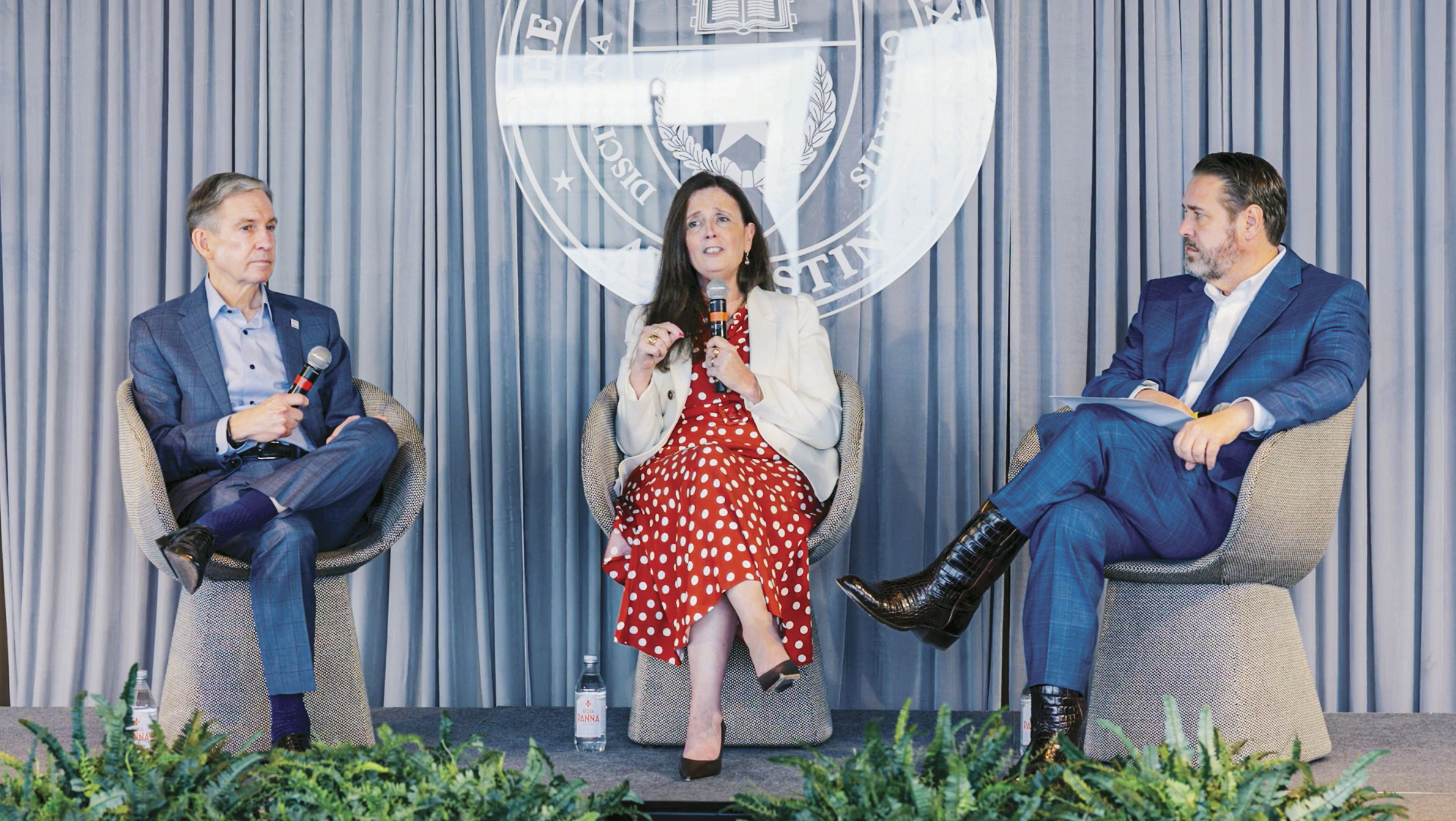 Pisters, Lucchinetti, and Davis speaking at event.