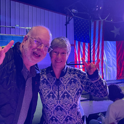 Two fans give a Hook Em Horns at an Off Broadway production. 