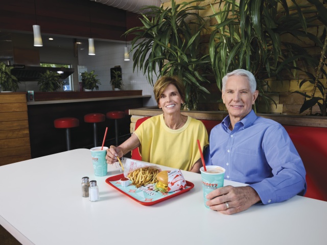 Patrick and Kathy Terry sit in their restaurant. 