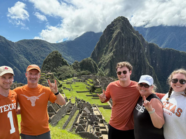 Family of UT alumni atop Machu Picchu.