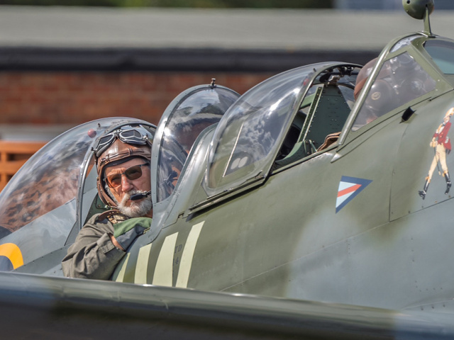 Pilot in a Mk IX Spitfire.