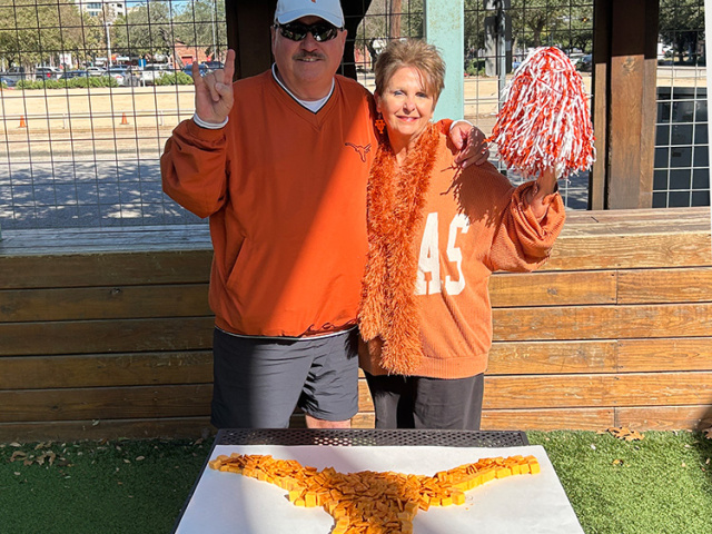 A pair of Texas fans in burnt orange with a Longhorn shaped from Cheez-Its