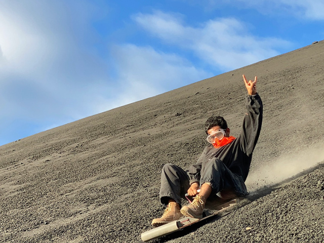 Surfing down the side of El Cerro Negro.