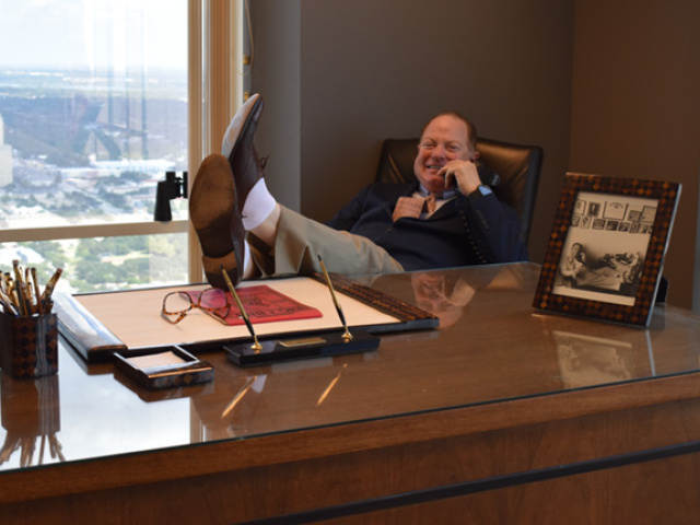 Jordan Cowman at the desk of Edward A. Clark.