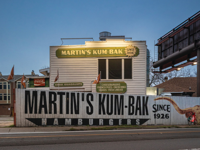 The exterior of a building with signs that read "Martin's Kum-Bak Hamburgers since 1926."
