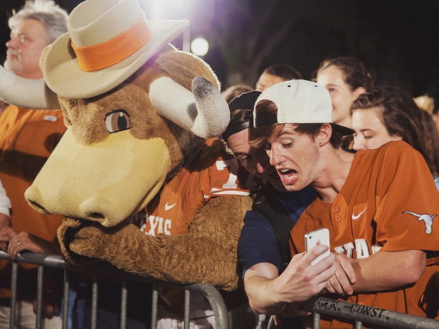 Texas Fight: Scenes from the Torchlight Parade and Rally