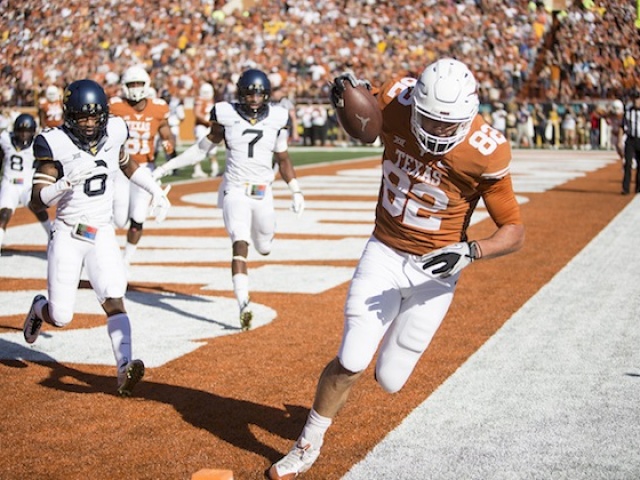 Texas Rolls Over West Virginia, 33-16