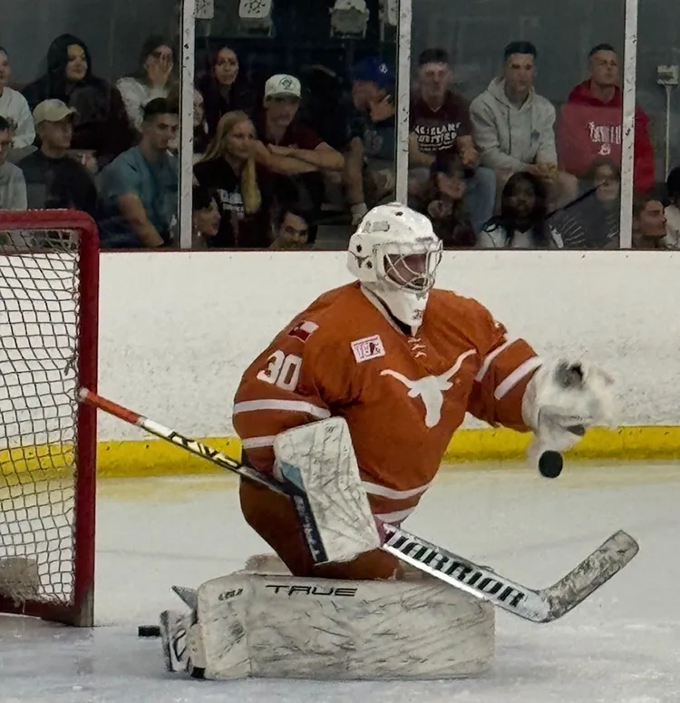 Texas hockey goalie on the ice. 