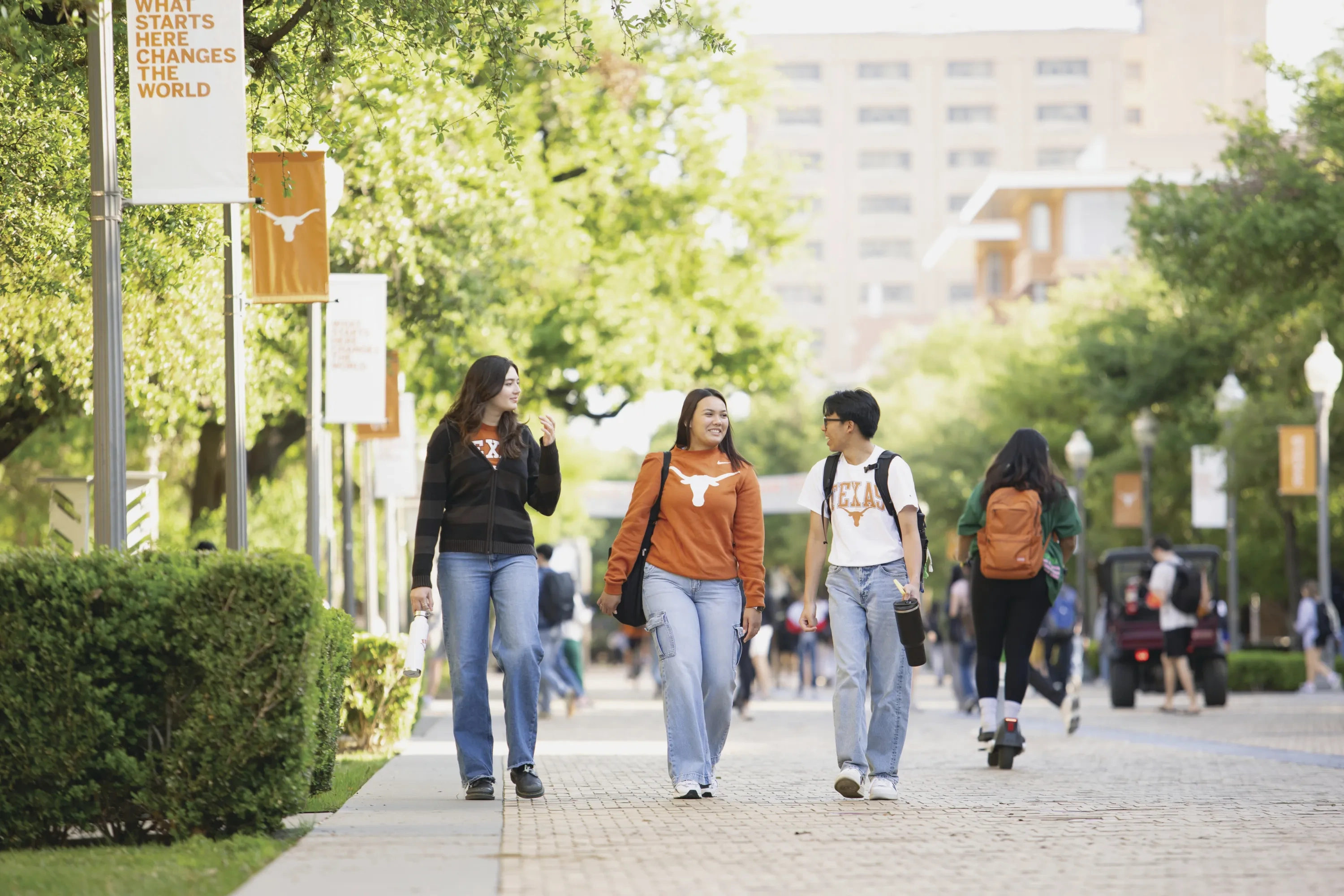 Students walk on UT's campus.