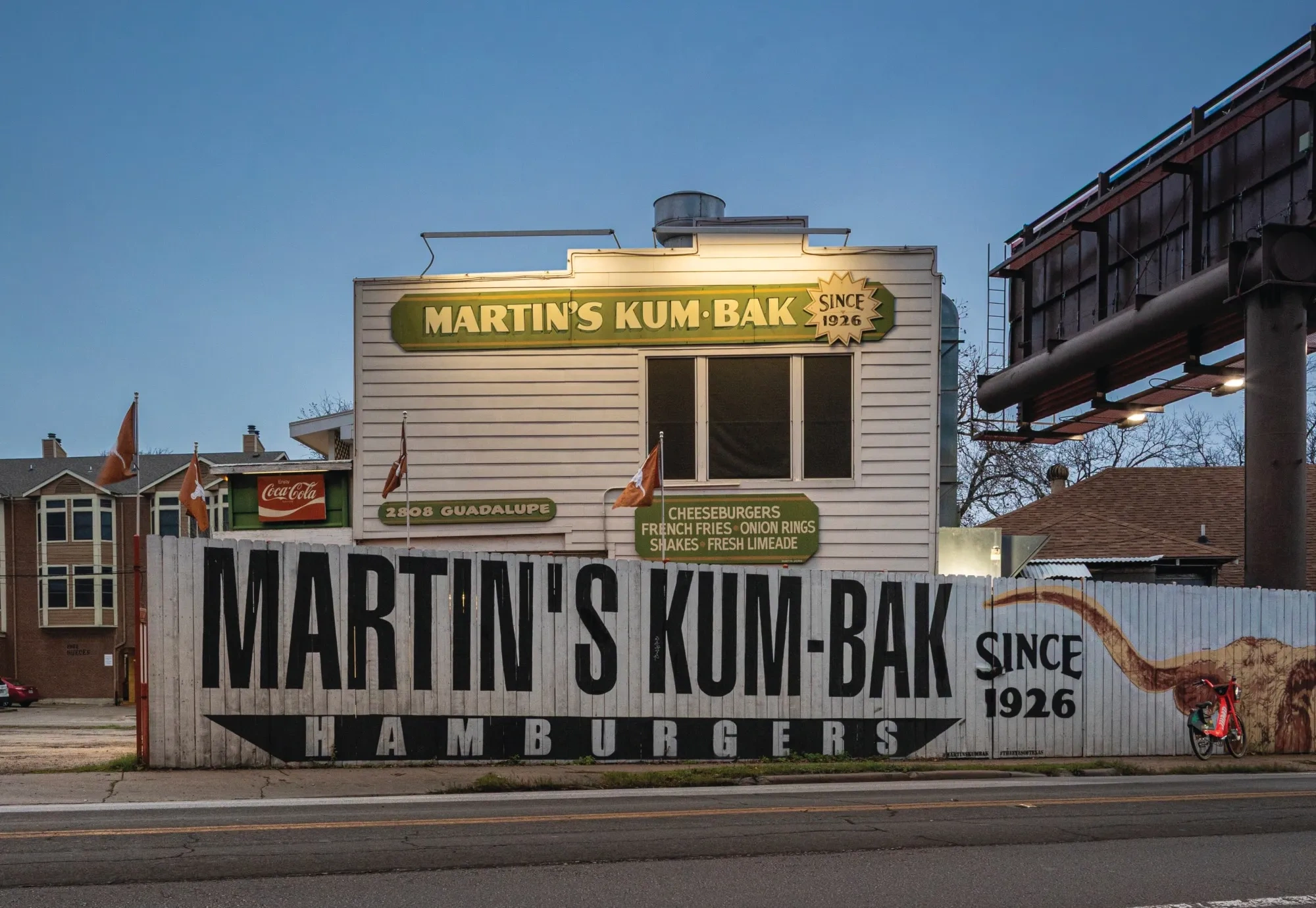 The exterior of a building with signs that read "Martin's Kum-Bak Hamburgers since 1926."