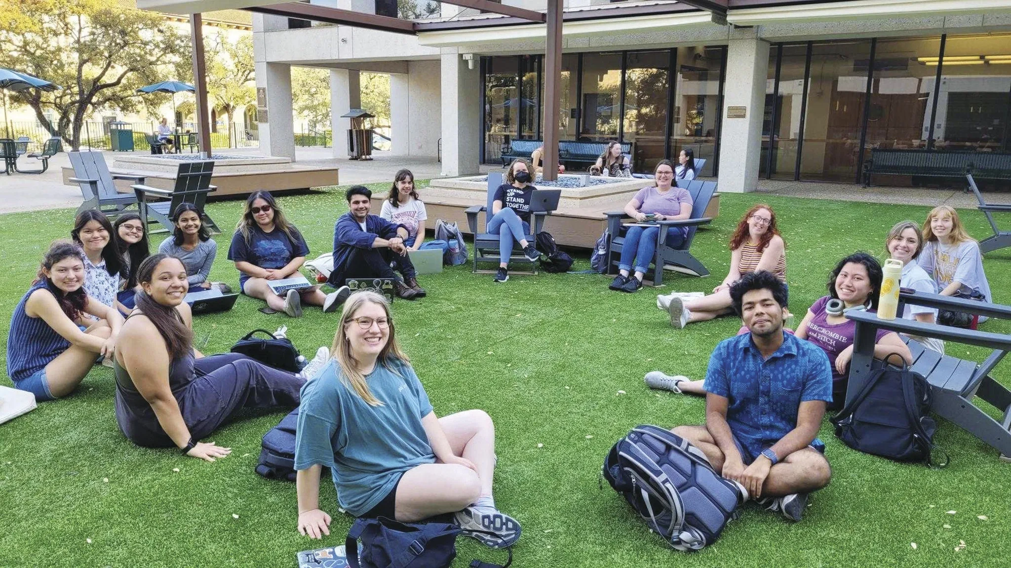 students meet on the lawn
