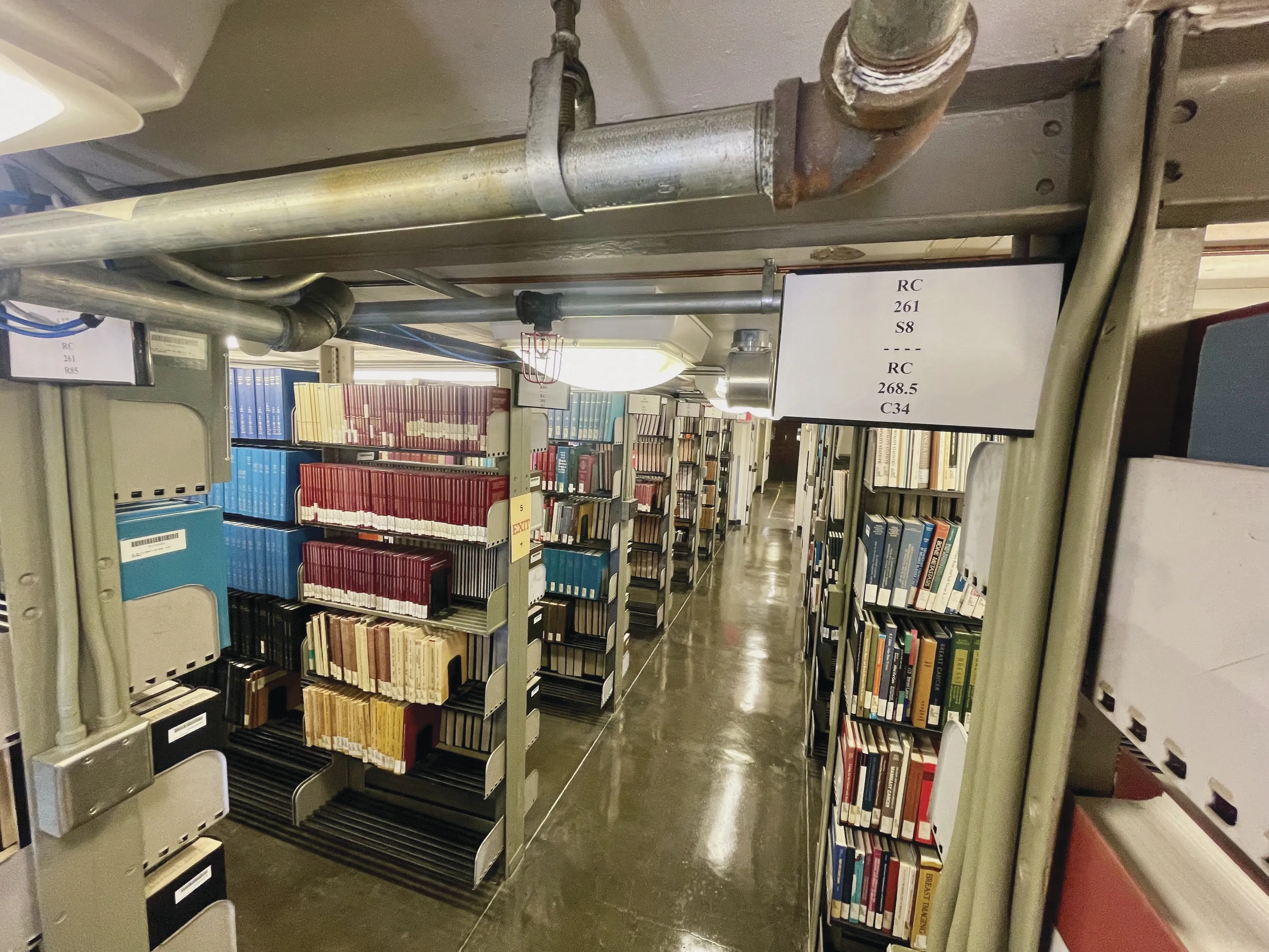 A photo within the stacks of the University of Texas Life Science Library.