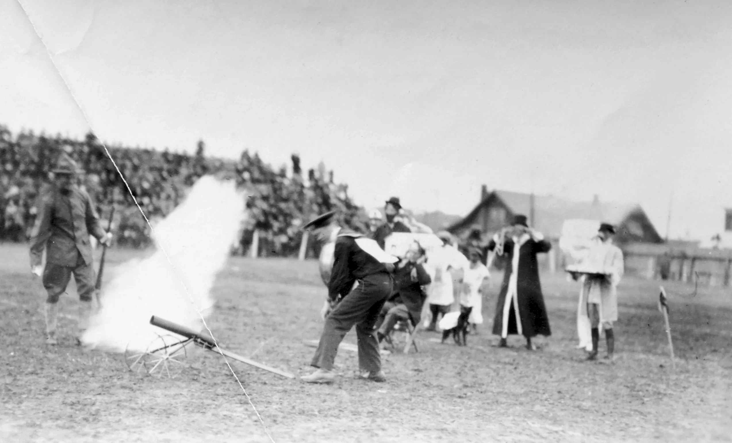 An archival photo of a halftime show at a football game, 1914.