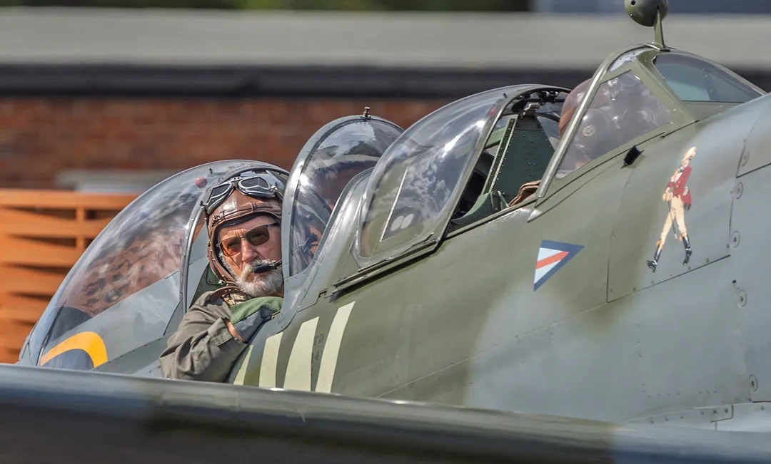 Pilot in a Mk IX Spitfire.